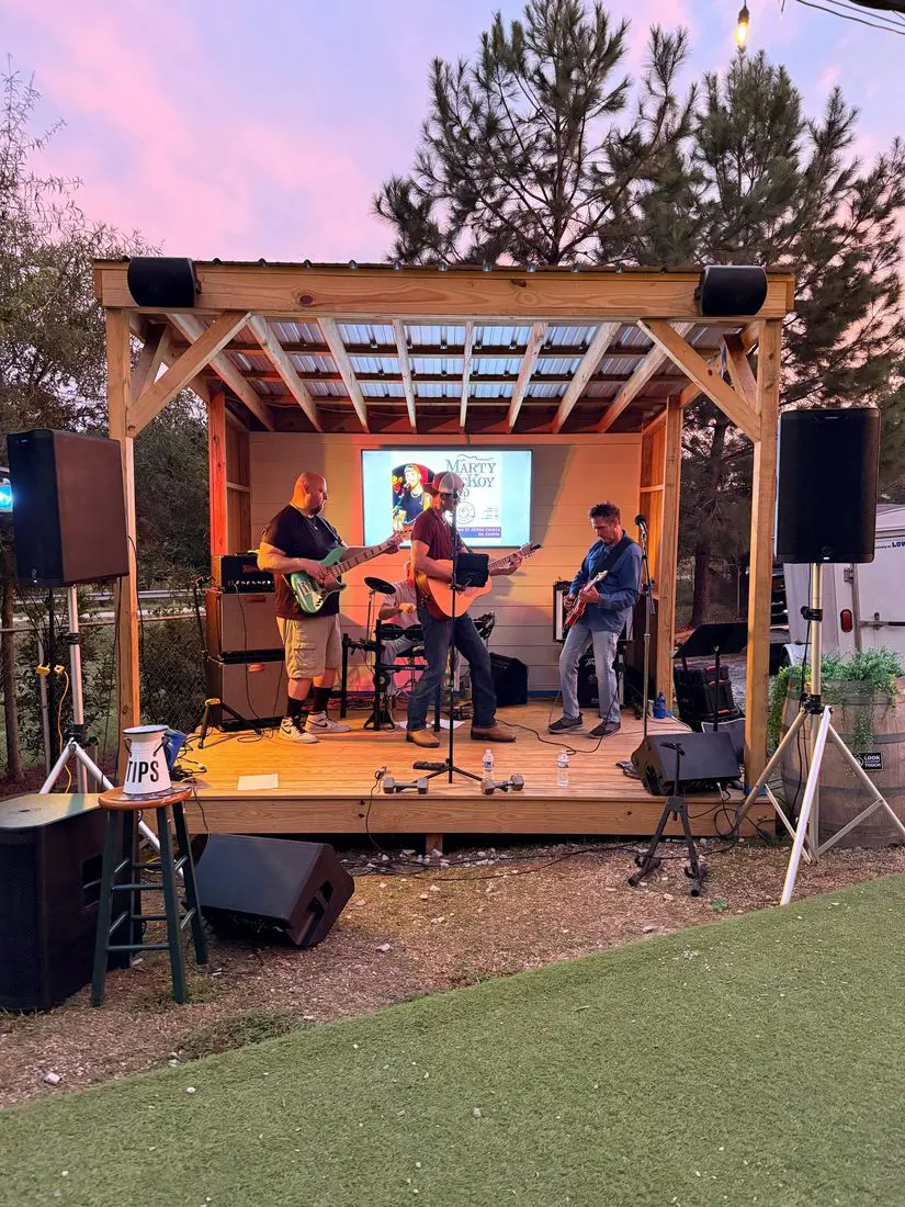Live band on the stage at sunset
