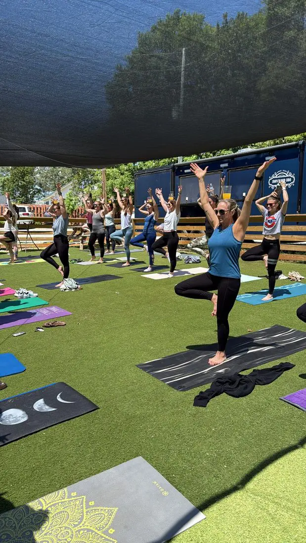 Mimosa yoga class on the turf