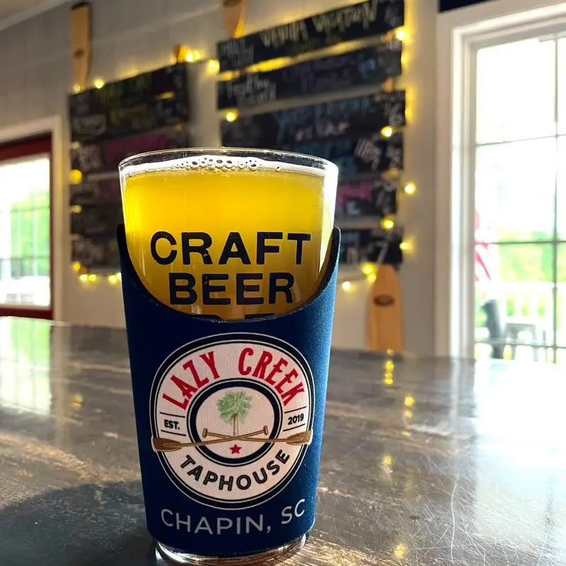 Lazy Creek branded glass on the bar