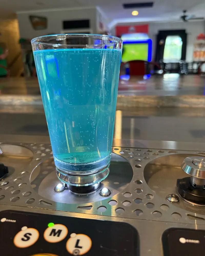 Pint of blue Blue Quencher on the Bottoms Up dispenser