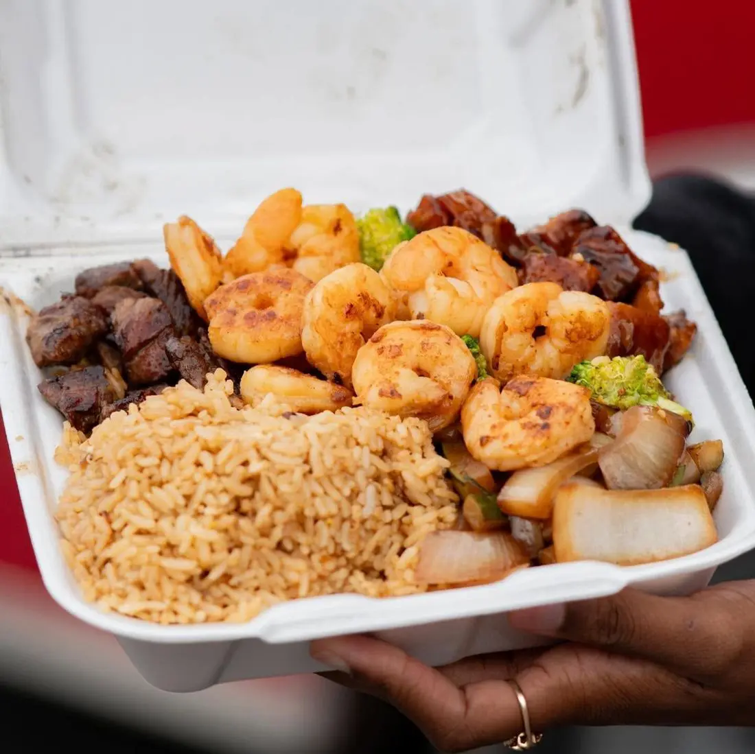 Tasty Teppanyaki hibachi plate with shrimp, steak and fried rice
